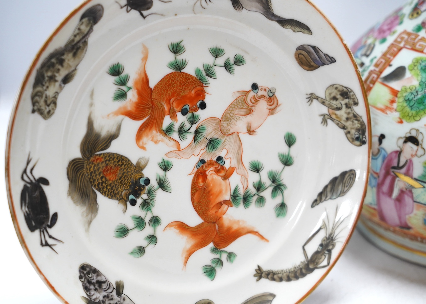 A 19th century Chinese famille rose bottle vase together with four plates, vase 28cm high. Condition - ranging from fair to good